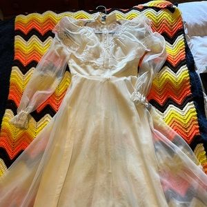 Cream colored sheer-sleeved prairie dress